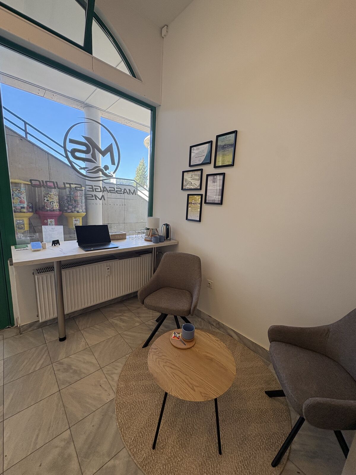 The reception desk by the studio window